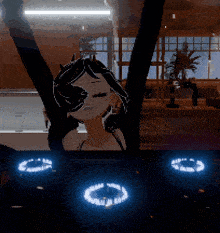 a girl with horns is standing in a room with her arms in the air