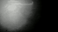 a black and white photo of lightning strikes in the sky