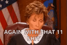 a judge is sitting in front of an american flag and says `` again with that 11 shit ''