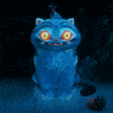a blue cat with a bird on top of it