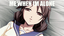 a girl is laying on a bed with the words me when i 'm alone above her
