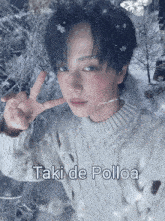 a picture of a person in a sweater with the name taki de polloa on the bottom