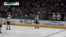 a hockey game is being played in texas and comerica bank is sponsoring the game