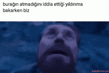 a picture of a man with his eyes closed and a caption that says makeimeme