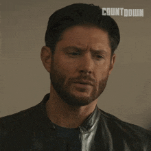 a man with a beard says you 're kidding with his eyes closed