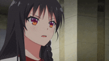 a girl with braided hair has a very angry expression on her face