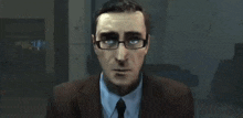 a man wearing glasses and a suit says " what "