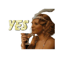 a woman holding a glass of wine with the word yes written in gold