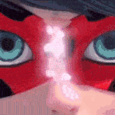 a close up of a person 's face with a red mask on