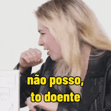 a woman in a leather jacket is coughing and says não posso , to doente