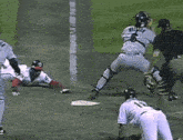 a baseball player wearing a number 9 jersey slides into second base