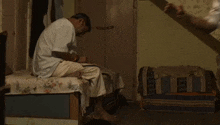 two men are standing next to each other in a room .