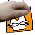 a close up of a person 's hand holding a piece of paper with a drawing of a cat on it .