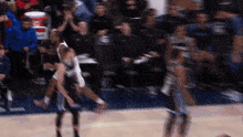 a blurred image of a basketball game with a gatorade can in the background