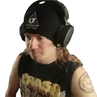 a man wearing headphones and a beanie with austin on it