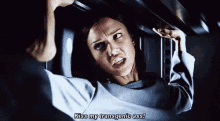 a woman says kiss my transgenic ass while sitting in a chair
