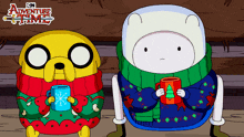 two cartoon characters from adventure time sitting next to each other holding mugs