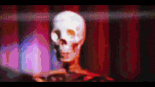 a pixelated image of a skeleton with a red curtain behind it