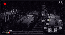 a video game screen shows a dining area at night