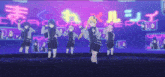 a group of anime girls are dancing in front of a neon sign that says ' energy ' on it