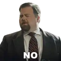 a man in a suit and tie has the word no on his chest