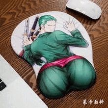 a mouse pad with a picture of roronoa zoro on it is laying on a wooden table .