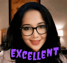 a woman wearing glasses is smiling with the words excellent above her