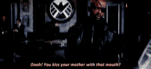 a man with a shield on the wall says " you kiss your mother with that mouth "