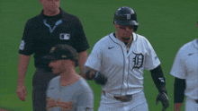 a baseball player wearing a jersey with the letter d on the front