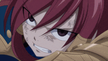 a close up of a person with red hair