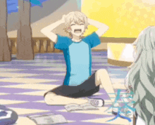 a cartoon character is sitting on the floor with his hands on his head and screaming .