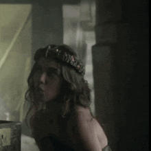 a woman with a crown on her head that says ' princess '