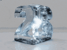 a block of ice that looks like the number 28