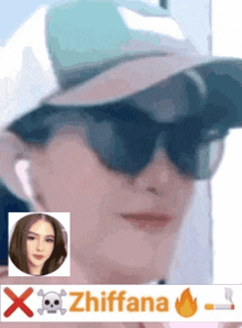 a woman wearing sunglasses and a hat has a skull and crossbones on her head