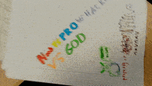 a child 's drawing on a piece of graph paper that says good on it