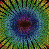 a rainbow colored circle with a black center
