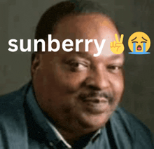 a man with the word sunberry written on his face