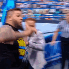 Kevin Owens Stunner GIF - Kevin Owens Stunner Roman Reigns GIFs