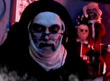 a man in a nun costume is wearing glasses and a scary mask