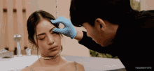 a man is touching a woman 's forehead with the words " yourstype " on the bottom