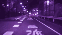 a blurry picture of a street with a red white and blue border