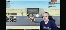 a man wearing headphones is playing a video game with a 415 star