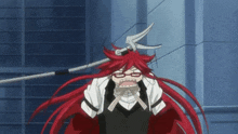 a cartoon character with red hair and glasses is holding a pair of scissors in her hand .