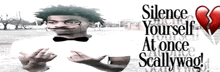 a man wearing a bow tie and glasses stands in front of a sign that says silence yourself at once scallywag