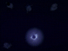 a group of glowing circles on a dark background