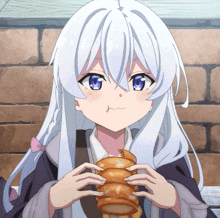a girl with white hair and blue eyes is holding a bread roll