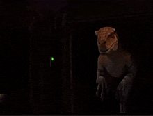 a close up of a dinosaur 's face with a dark background