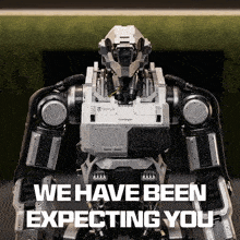 a robot with the words we have been expecting you on the bottom
