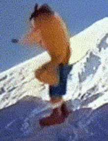 a person is skiing down a snow covered mountain