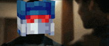 a pixelated image of a man wearing a blue and white hat